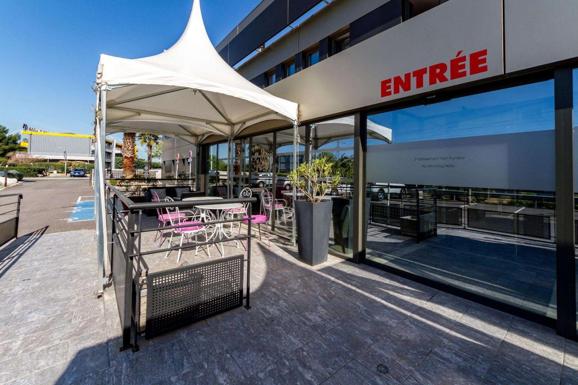 Brit Hotel Porte D'Espagne Perpignano Esterno foto