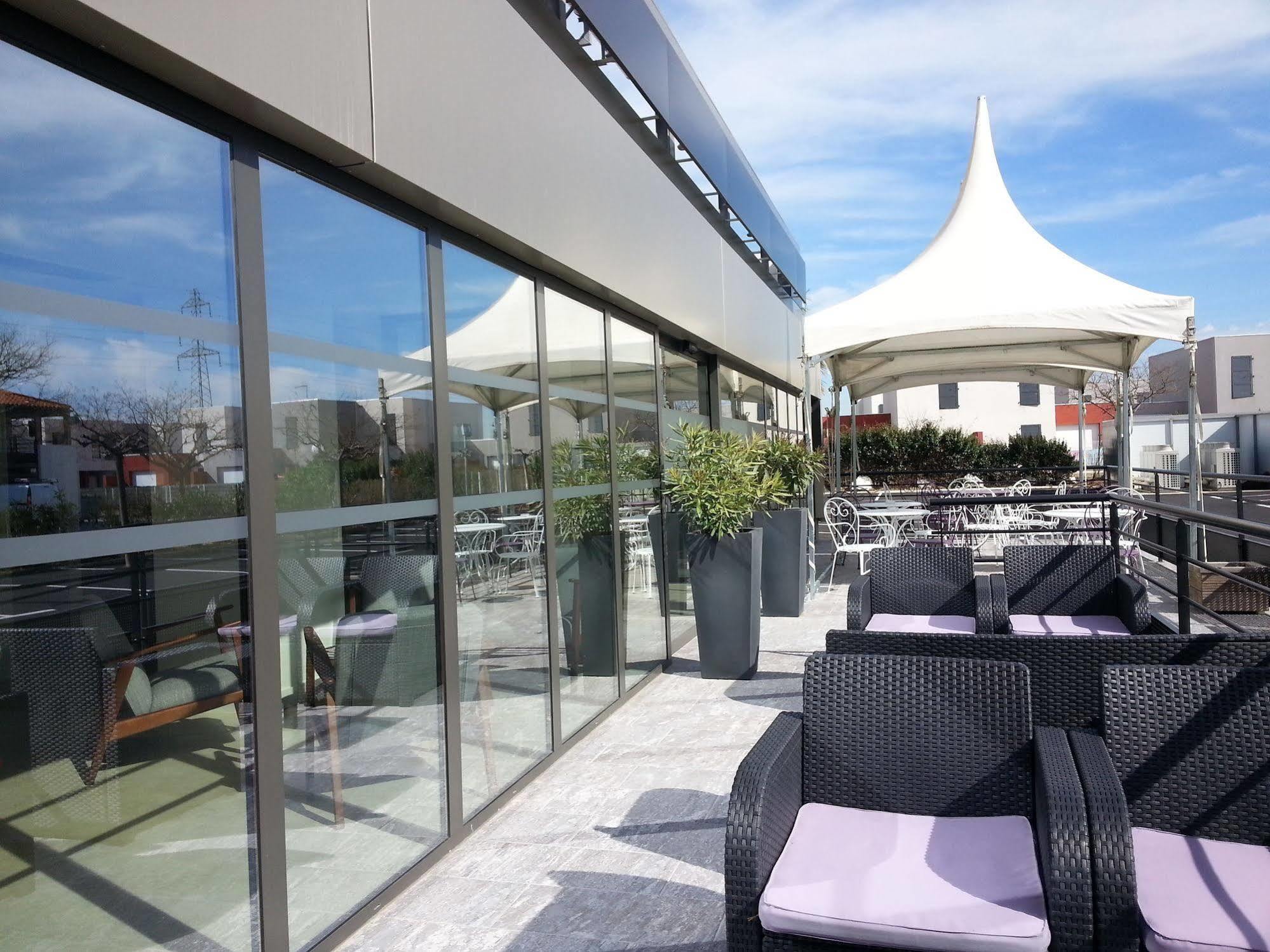 Brit Hotel Porte D'Espagne Perpignano Esterno foto